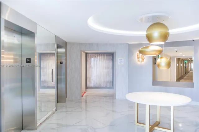 a view of a hallway with front door