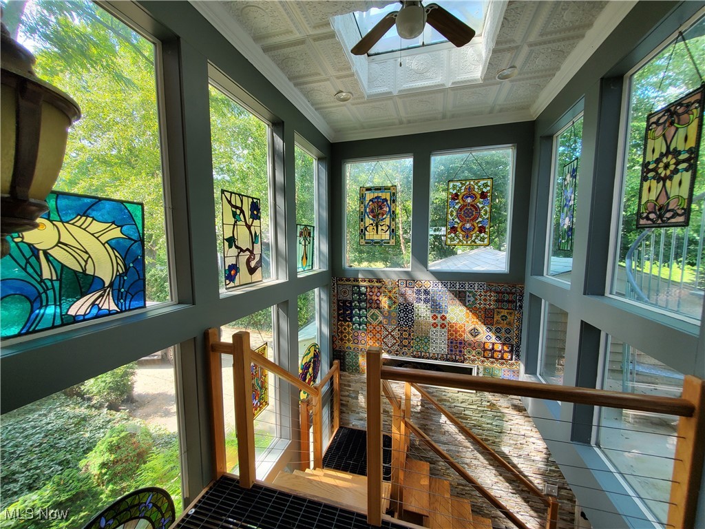 150 Main Street Hayesville, OH 44805 - Photo 29 of 50 Sunroom / solarium with crown molding and an ornate ceiling.