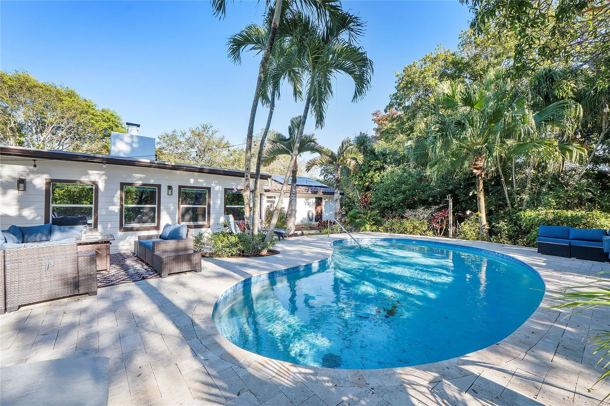 5351 Godfrey Road Parkland, FL 33067 - Photo 4 of 95 a view of a house with swimming pool and sitting area