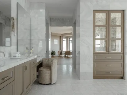 a kitchen with a table chairs and a fireplace