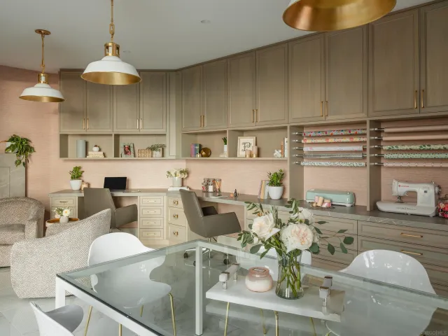 a bedroom with a bed and a lamp