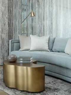 a view of a lake with a floor to ceiling window next to a yard