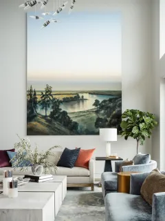 a view of a dining room with furniture a potted plant and a potted plant