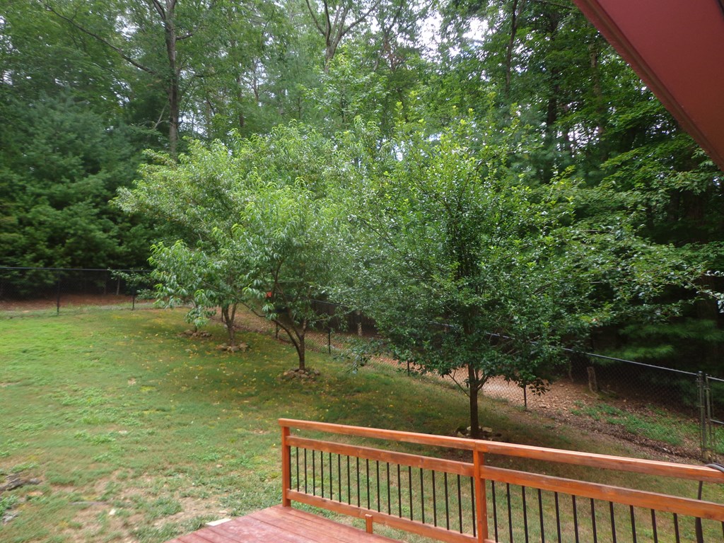 9547 Big Creek Road Ellijay, GA 30536 - Photo 8 of 82 a view of a lake from a balcony