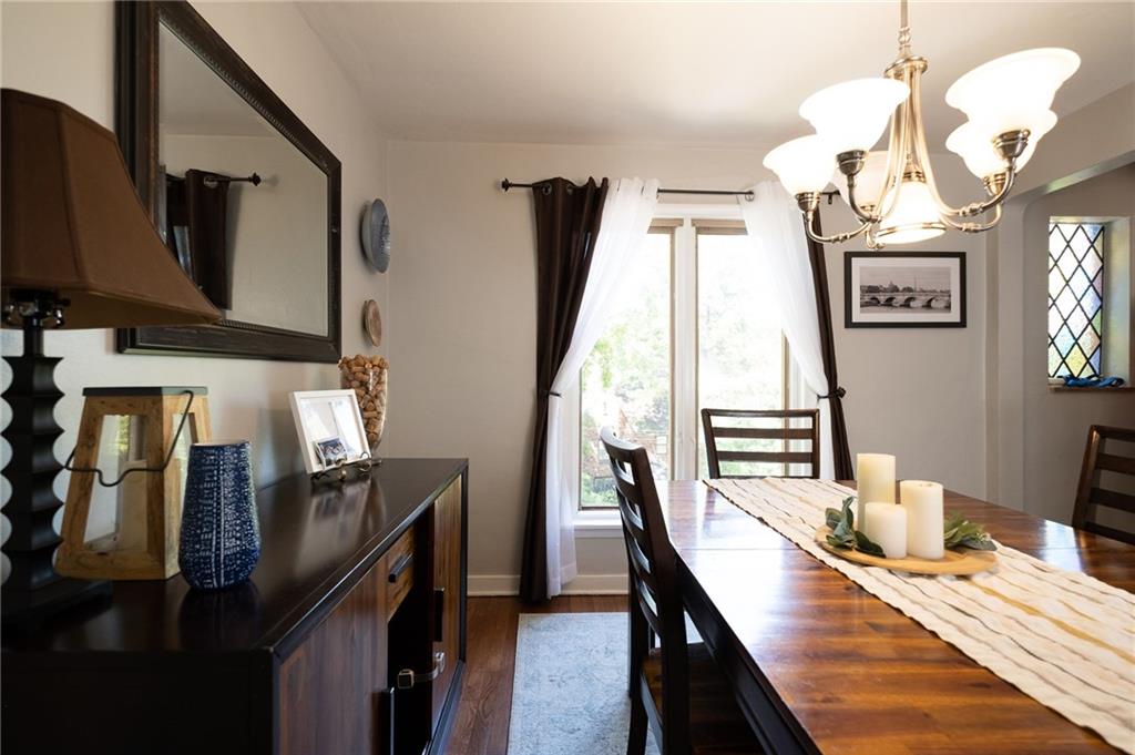 DINING ROOM: Lovely, updated kitchen with cherry cabinets & granite countertops.
