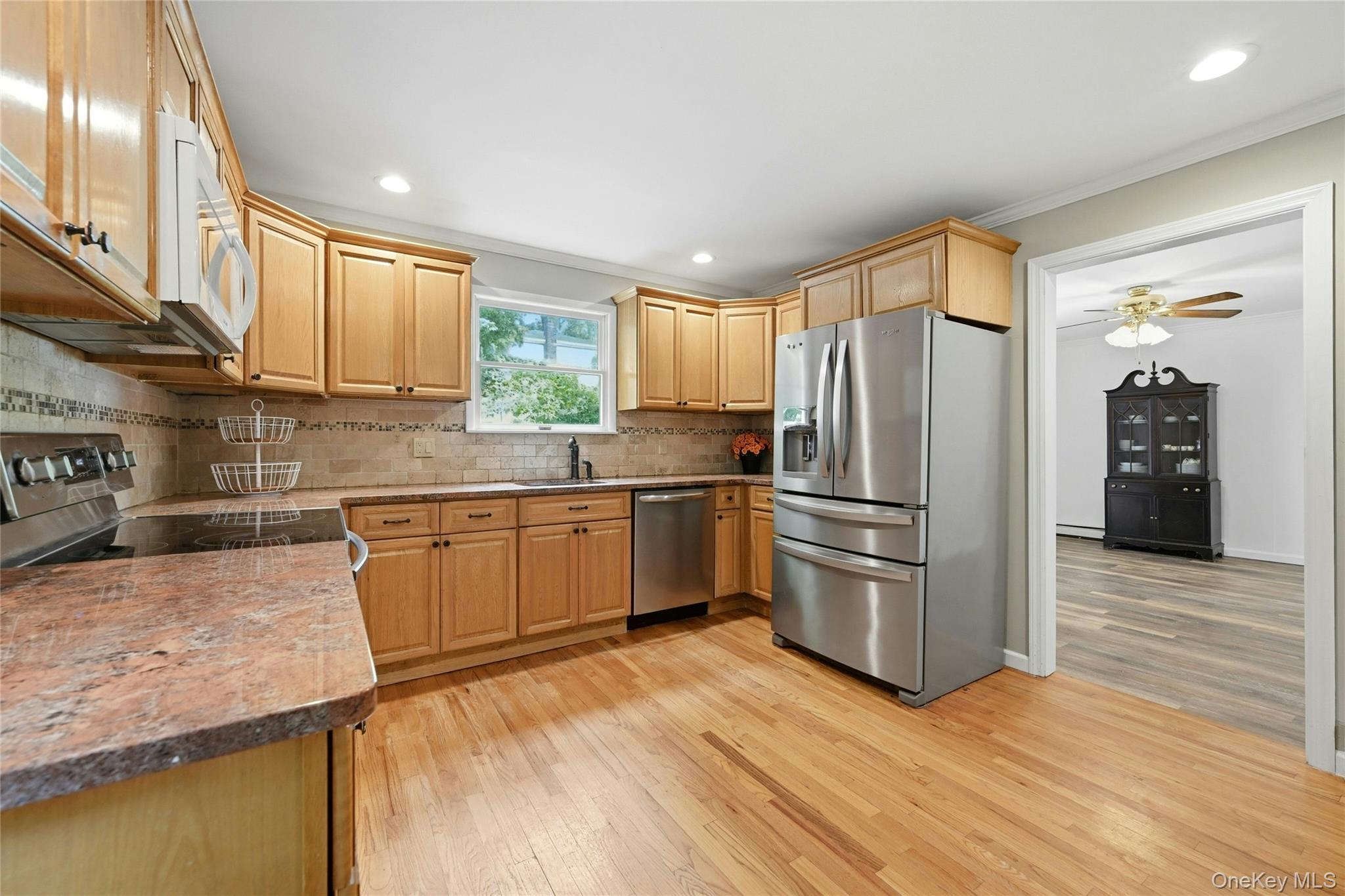 15 Birch Road Rocky Point, NY 11778 - Photo 8 of 30 Granite counters and access to the sitting room