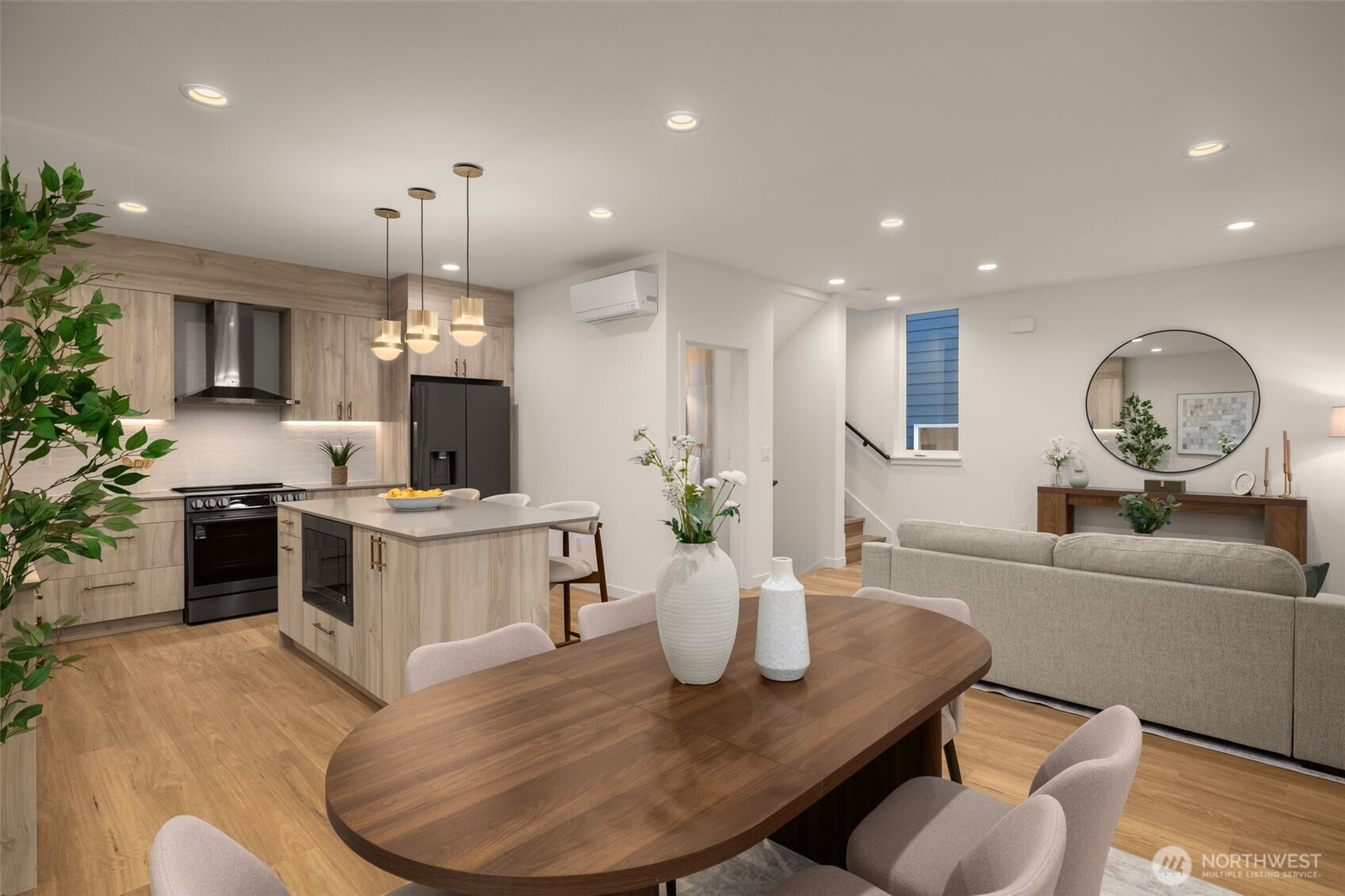 3914 South Juneau Street Seattle, WA 98118 - Photo 12 of 32 a large kitchen with a table and chairs