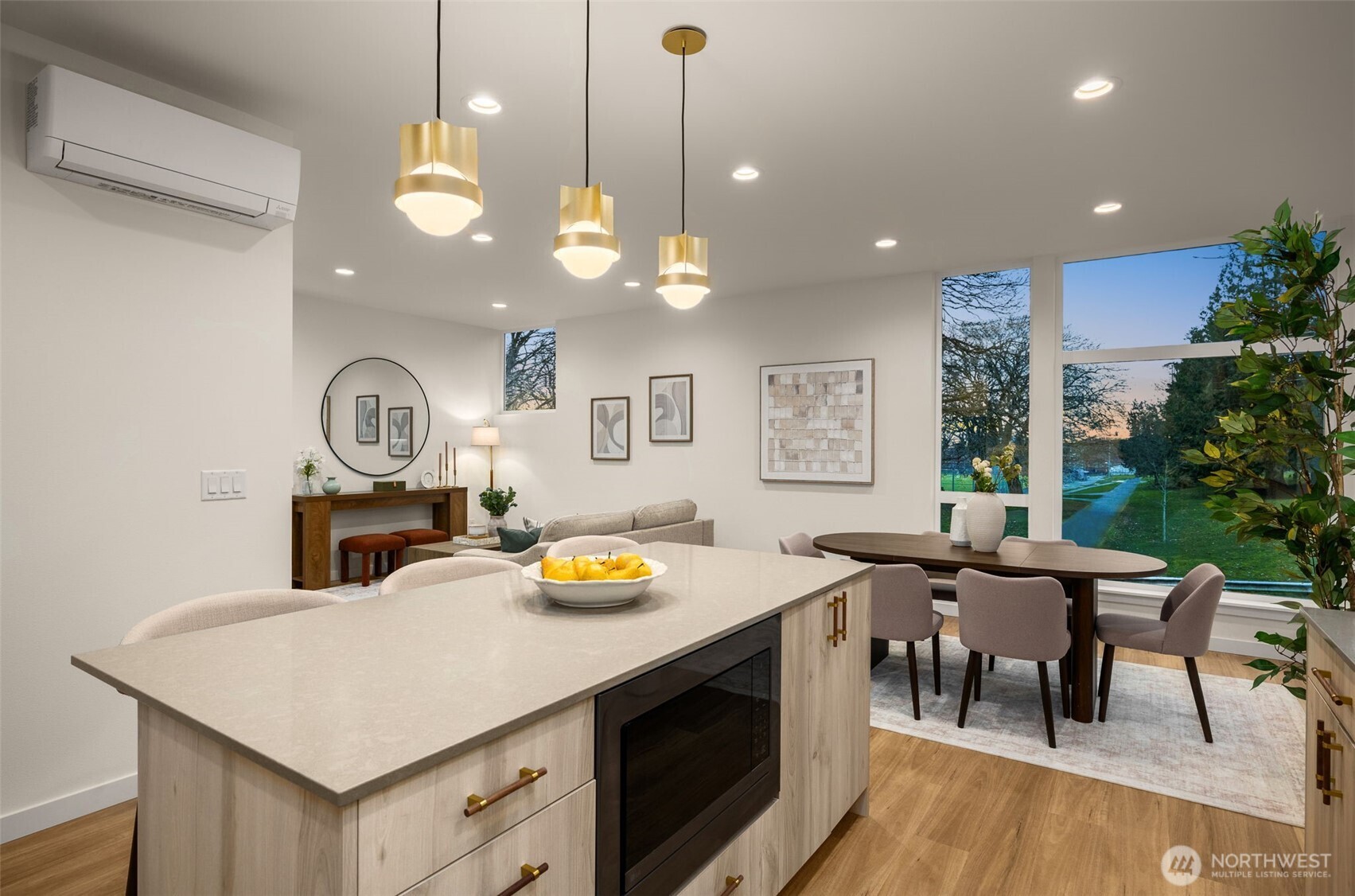3914 South Juneau Street Seattle, WA 98118 - Photo 13 of 32 an open kitchen with a table and chairs