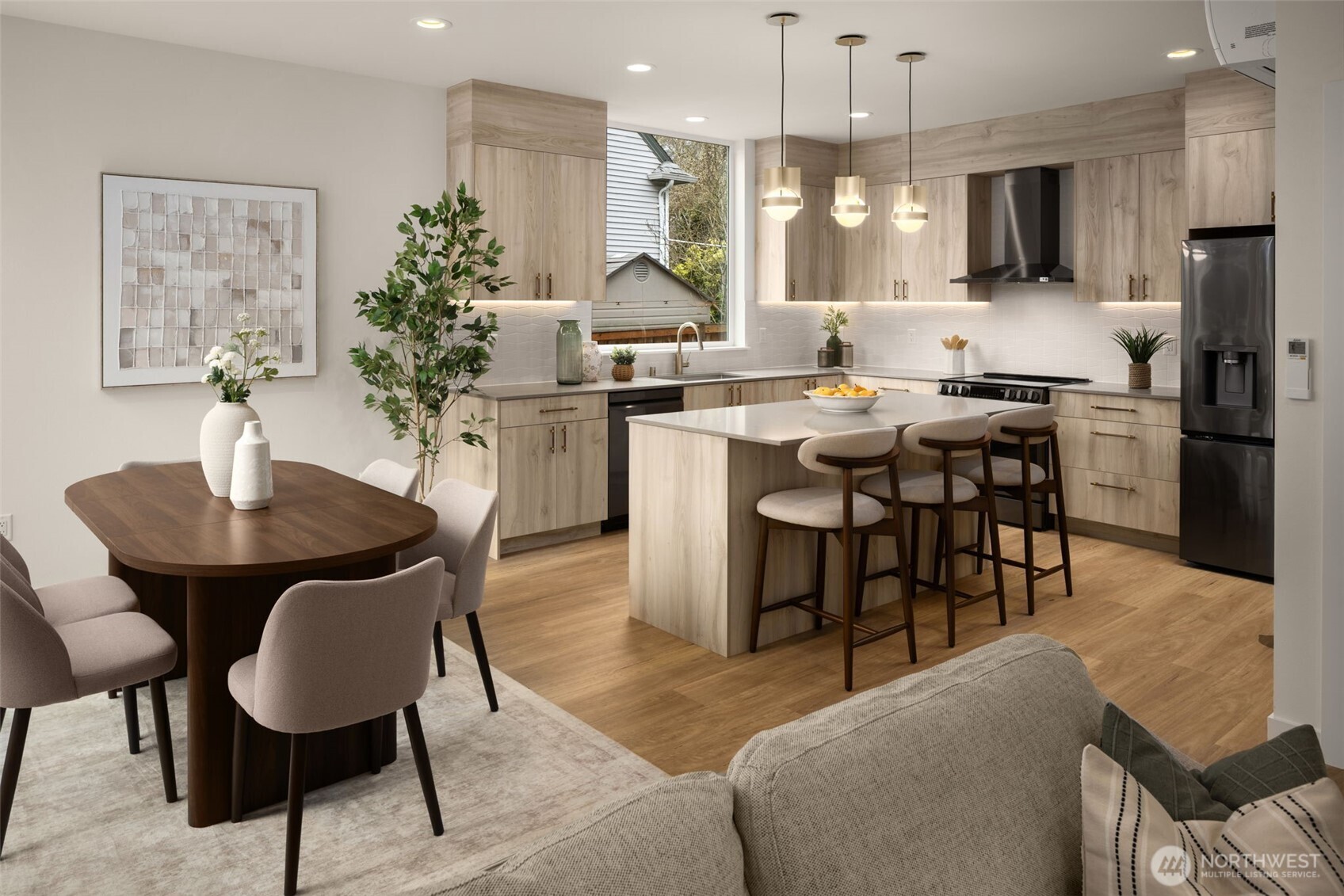3914 South Juneau Street Seattle, WA 98118 - Photo 14 of 32 a kitchen with a dining table chairs and refrigerator