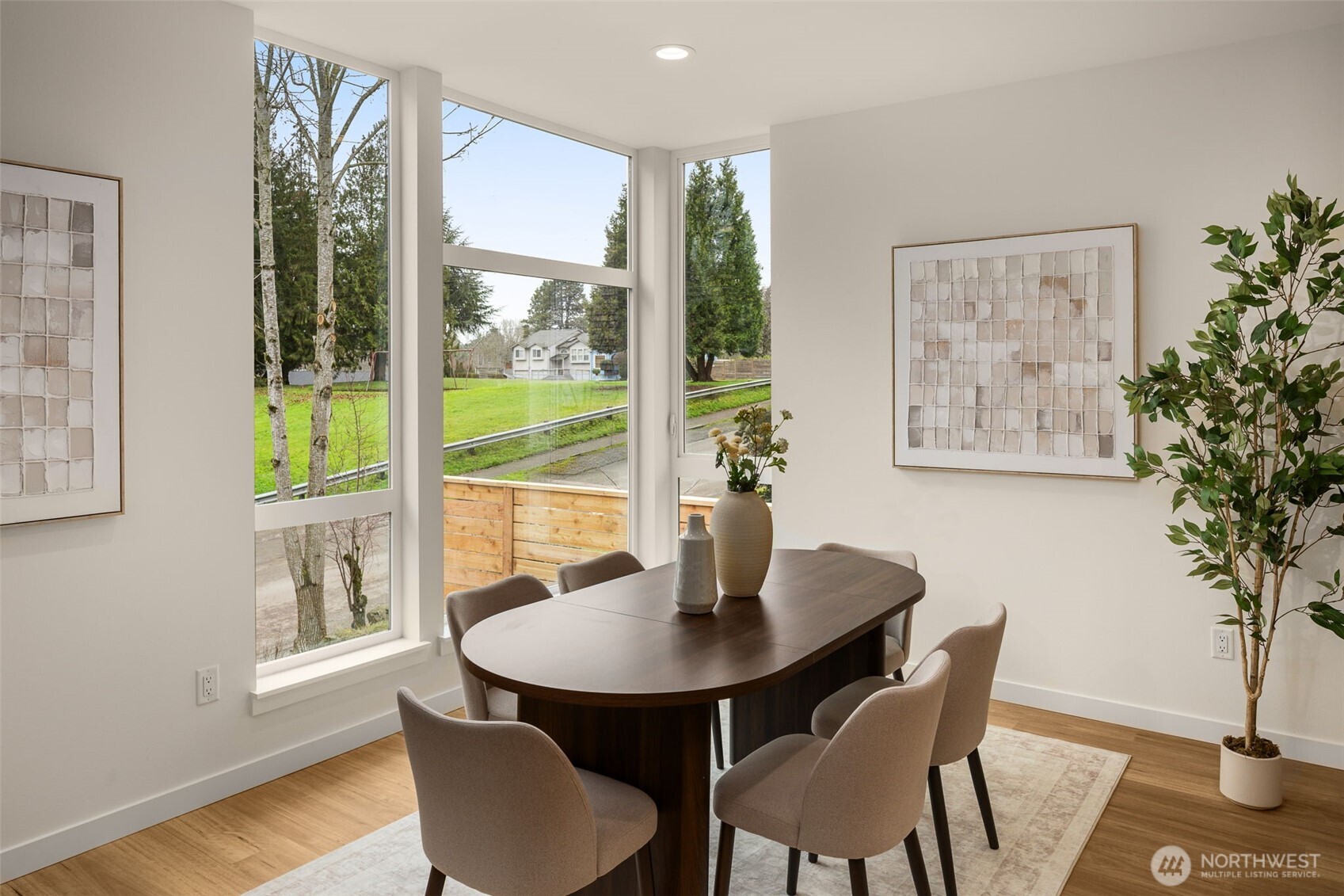 3914 South Juneau Street Seattle, WA 98118 - Photo 15 of 32 a view of a dining room with furniture window and wooden floor