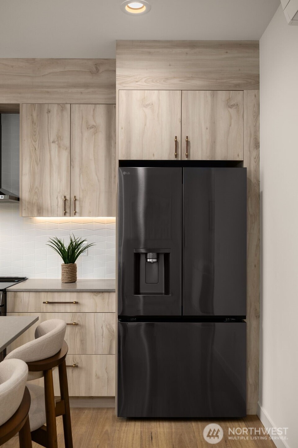 3914 South Juneau Street Seattle, WA 98118 - Photo 18 of 32 a kitchen with a refrigerator and table