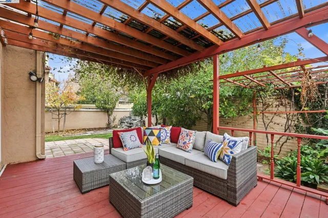 a outdoor living with furniture and garden view