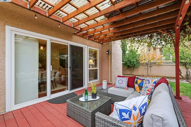 a outdoor living space with furniture and garden view