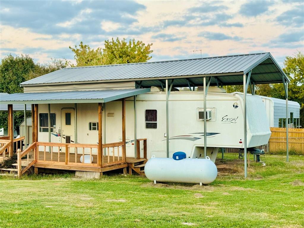 160 Rising Star Quitman, TX 75783 - Photo 2 of 27 a view of a house with backyard