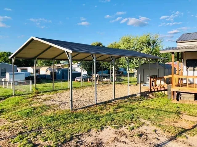a view of a house with backyard and porch