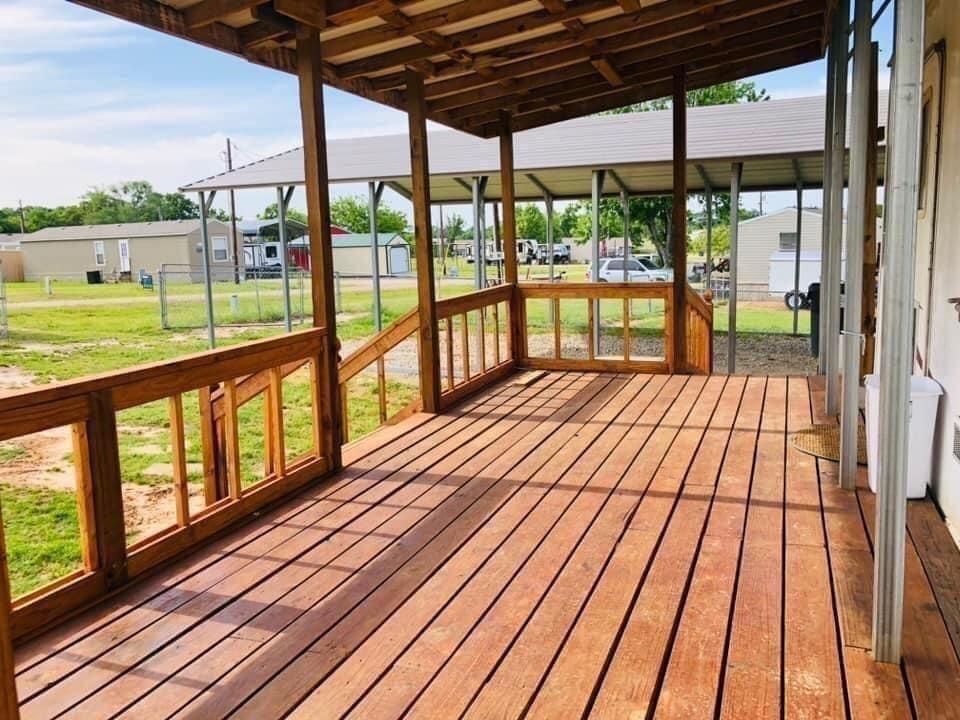 160 Rising Star Quitman, TX 75783 - Photo 8 of 27 a view of balcony with wooden floor
