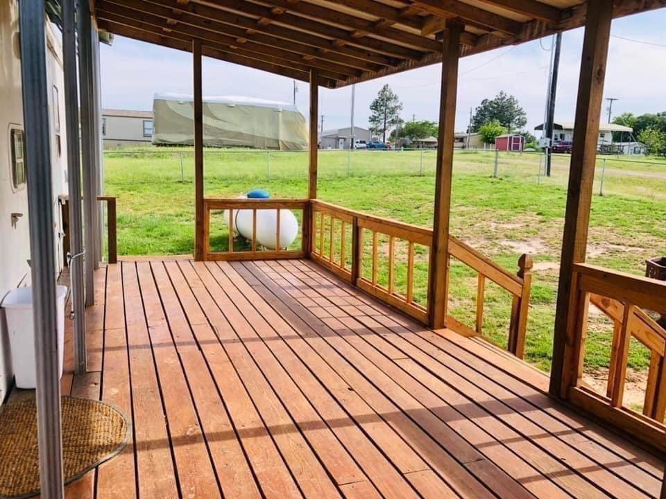 160 Rising Star Quitman, TX 75783 - Photo 9 of 27 a view of balcony with wooden floor