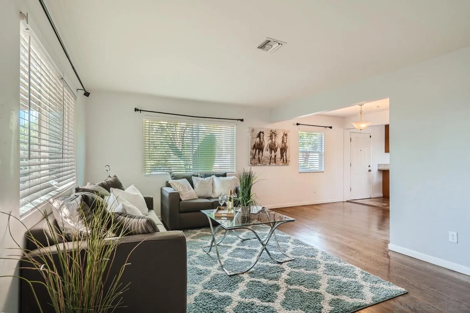 4817 Maple Avenue La Mesa, CA 91942 - Photo 11 of 31 a living room with furniture and a window