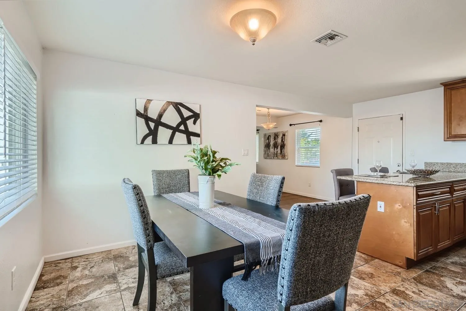 4817 Maple Avenue La Mesa, CA 91942 - Photo 12 of 31 a view of a dining room with furniture