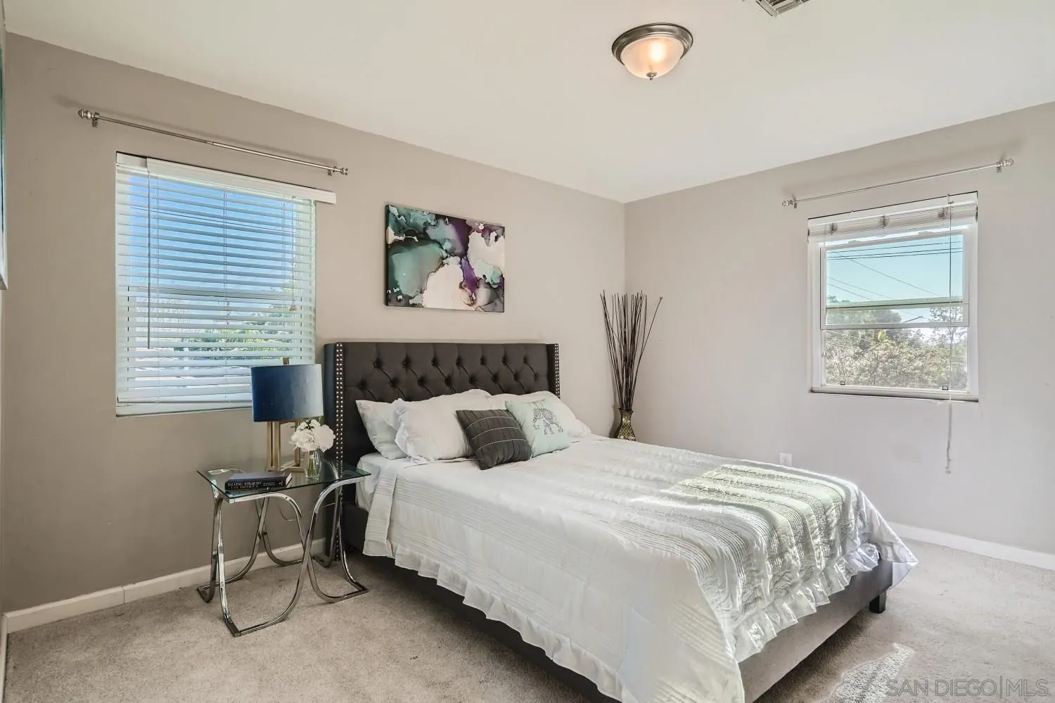 4817 Maple Avenue La Mesa, CA 91942 - Photo 17 of 31 a bedroom with bed and a window