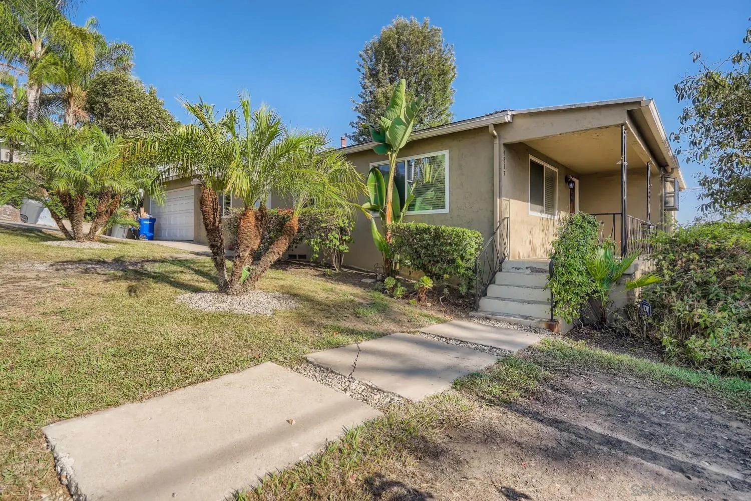 4817 Maple Avenue La Mesa, CA 91942 - Photo 5 of 31 a view of a house with backyard and plants