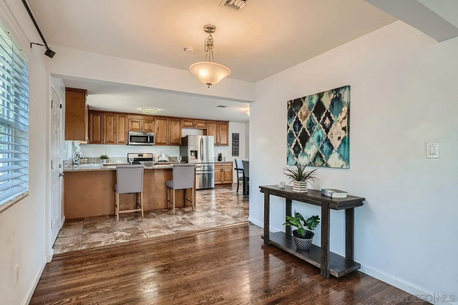 4817 Maple Avenue La Mesa, CA 91942 - Photo 8 of 31 a view of kitchen with furniture and wooden floor