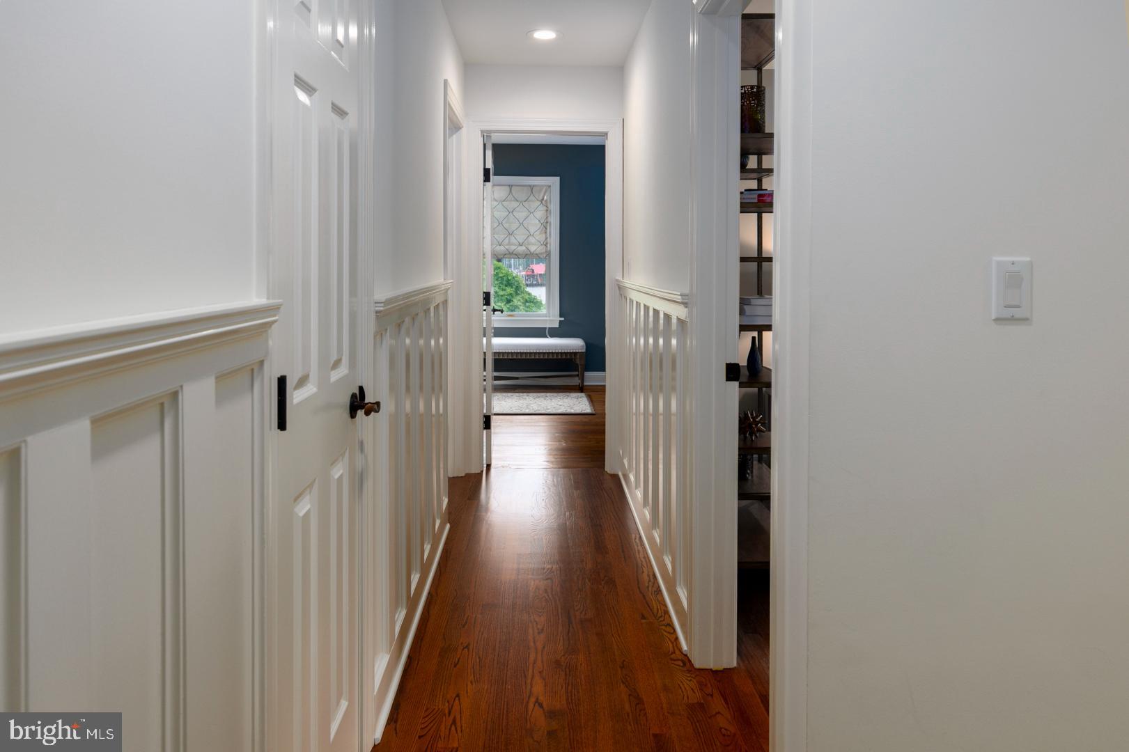 222 East Chestnut Street St. Michaels, MD 21663 - Photo 11 of 38 a view of a hallway with wooden floor