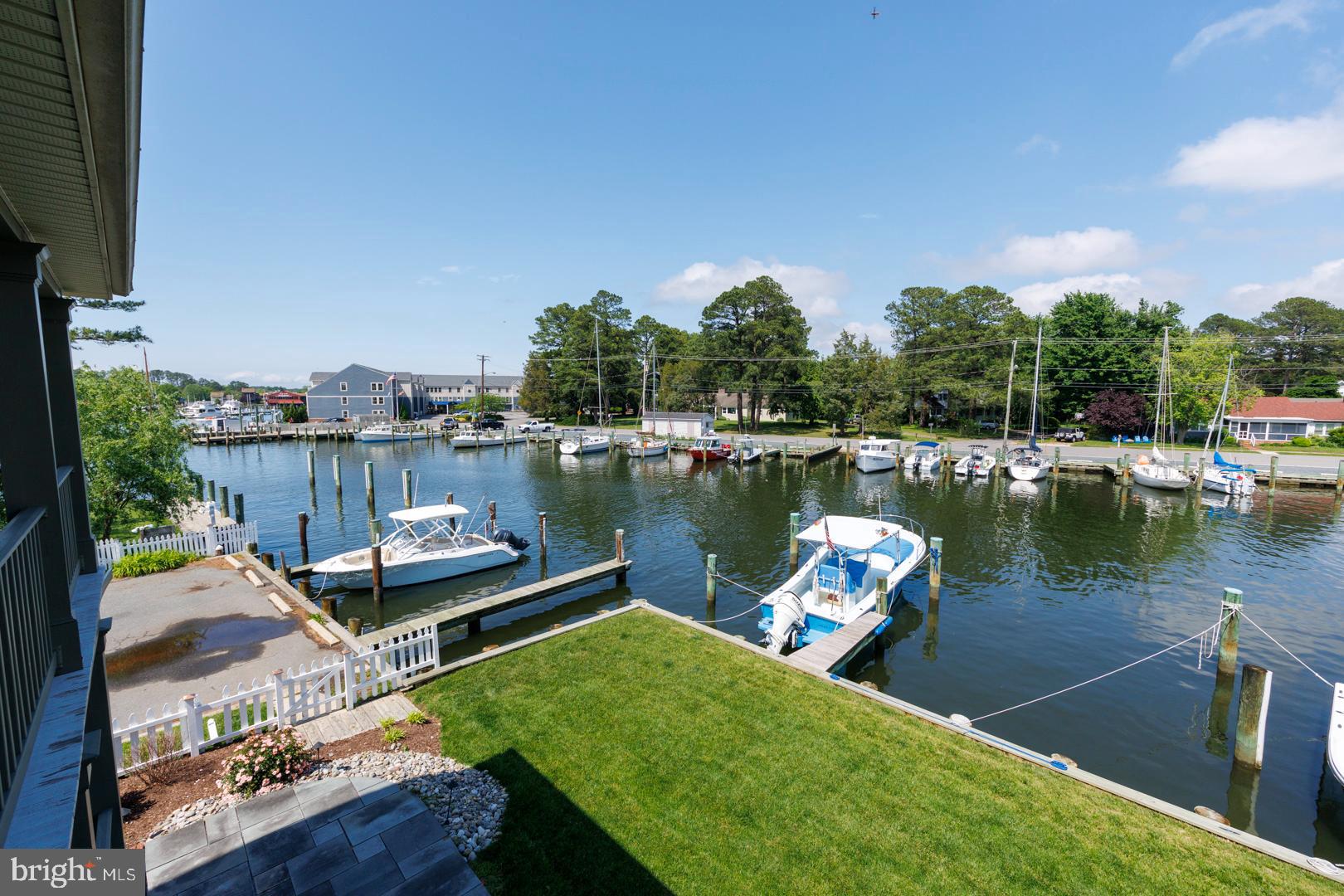 222 East Chestnut Street St. Michaels, MD 21663 - Photo 30 of 38 a view of a lake with sitting area
