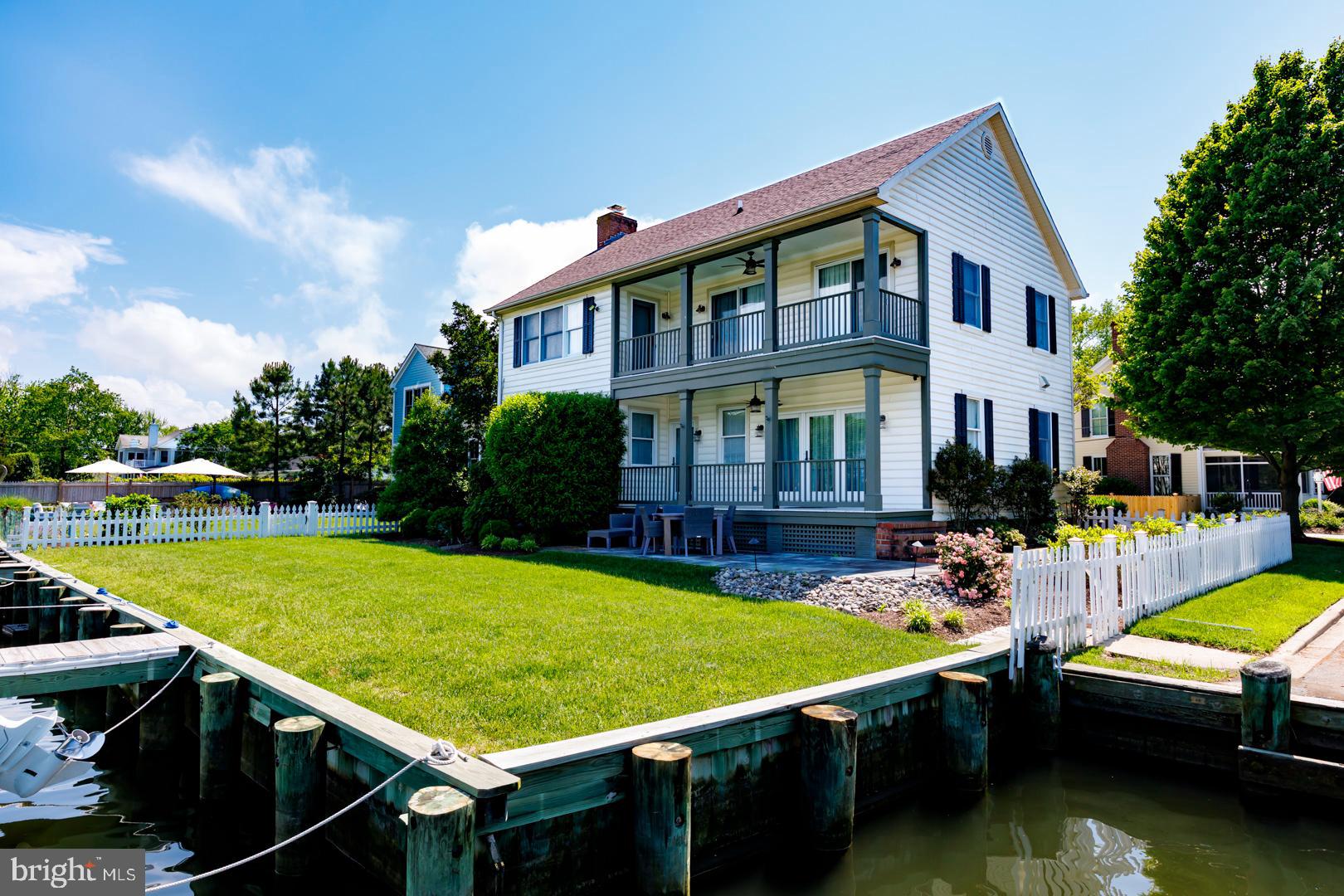 222 East Chestnut Street St. Michaels, MD 21663 - Photo 34 of 38 a view of a house with swimming pool and sitting area