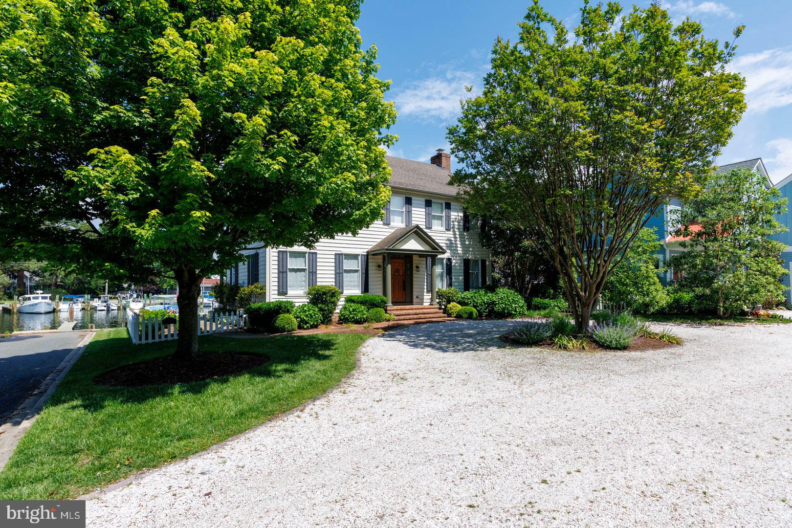 222 East Chestnut Street St. Michaels, MD 21663 - Photo 38 of 38 a front view of a house with garden
