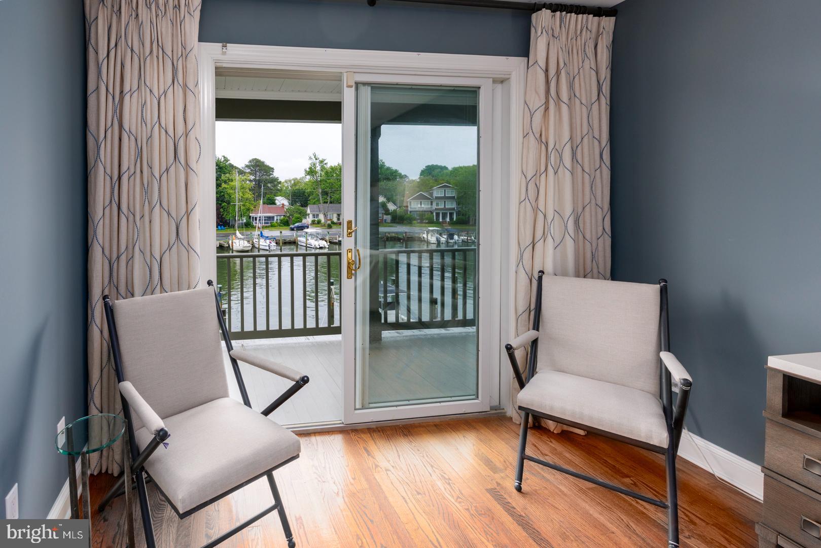 222 East Chestnut Street St. Michaels, MD 21663 - Photo 9 of 38 a view of a workspace with furniture and a window