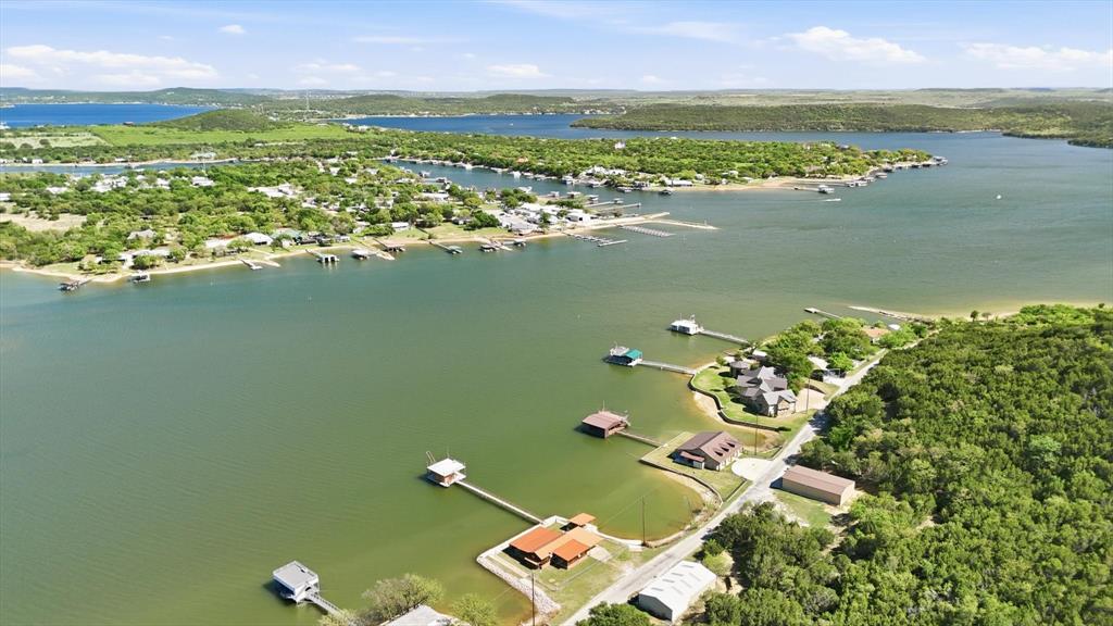 4513 Chapel Road Graham, TX 76450 - Photo 38 of 38 an aerial view of a houses with a lake view