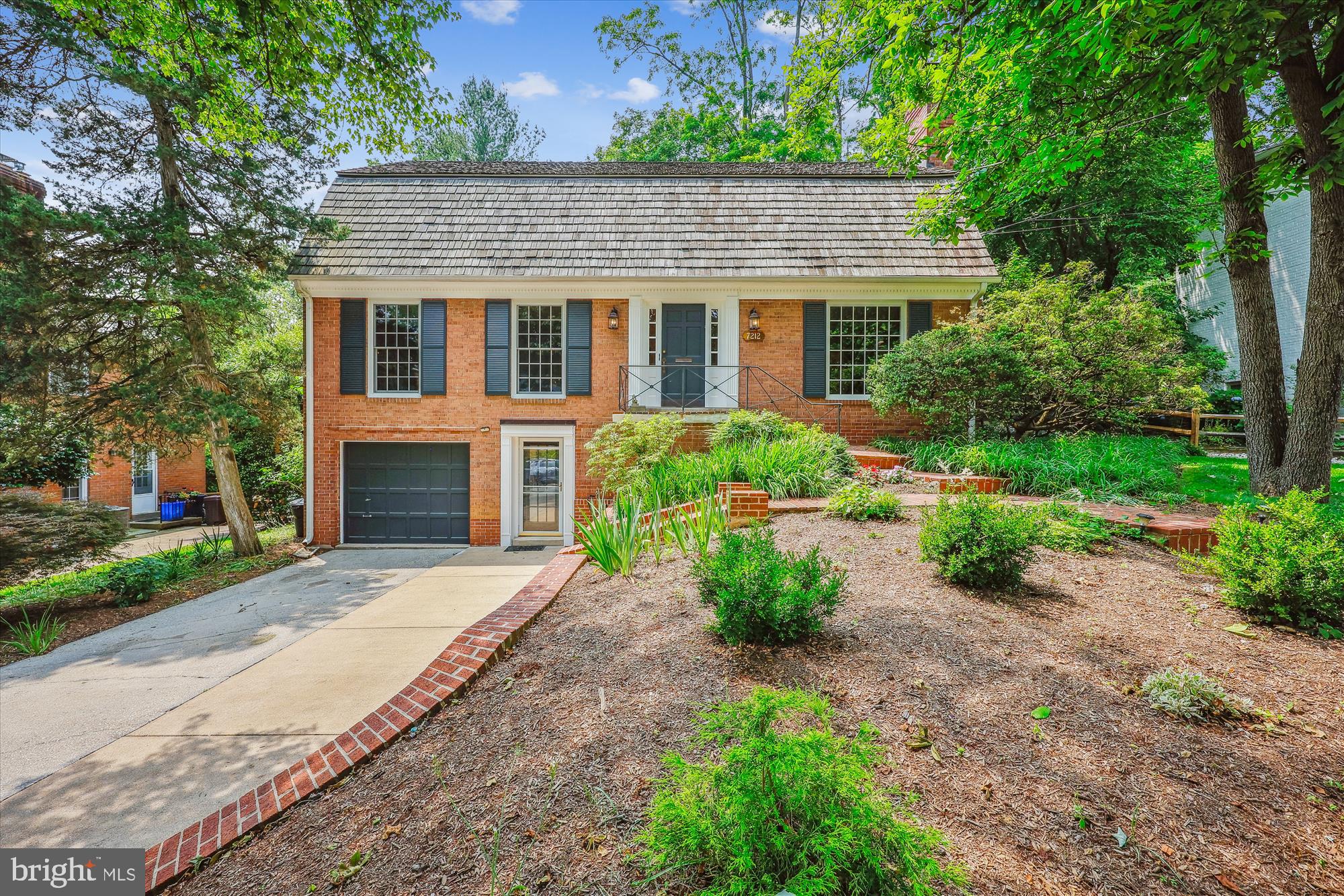 7212 Old Gate Road Rockville, MD 20852 - Photo 1 of 50 front view of a house with a yard and an trees