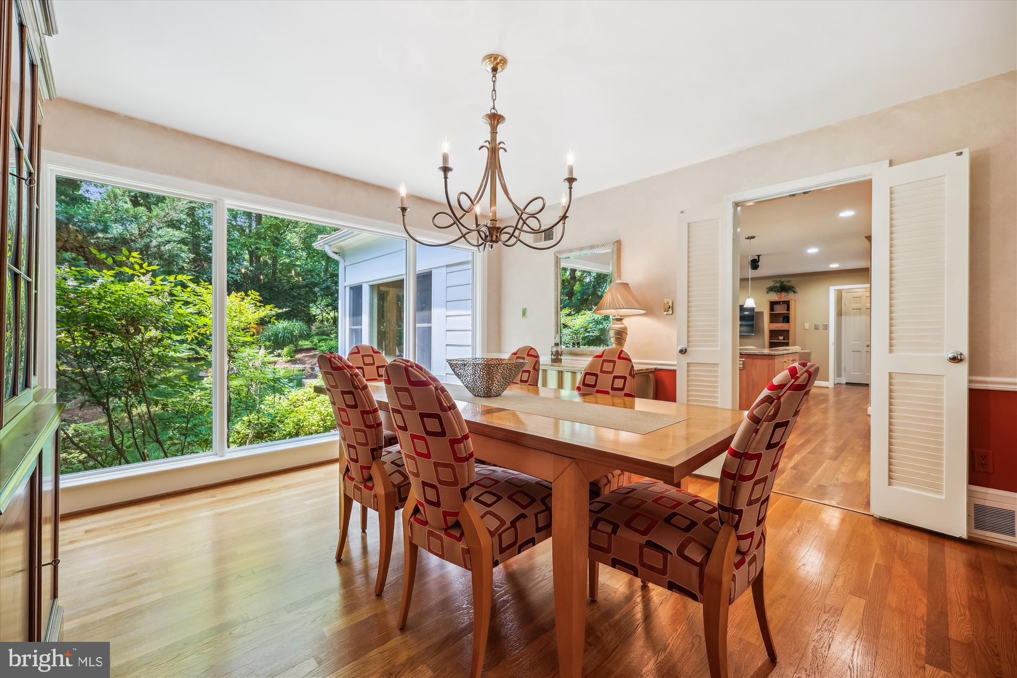 7212 Old Gate Road Rockville, MD 20852 - Photo 11 of 50 a view of a dining room with furniture window and wooden floor