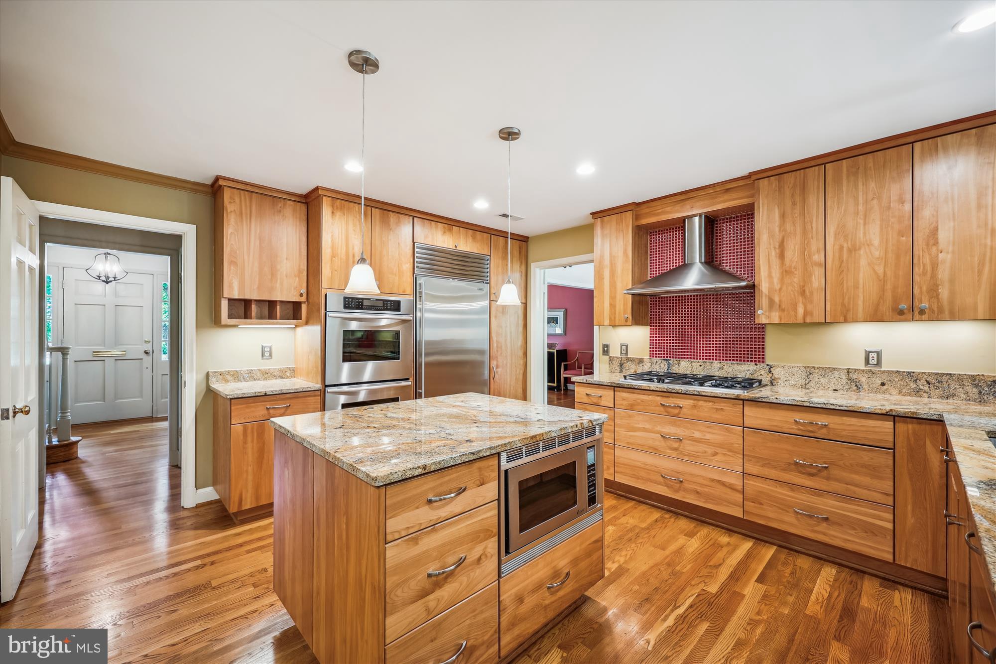 7212 Old Gate Road Rockville, MD 20852 - Photo 12 of 50 a kitchen with granite countertop a stove oven and sink