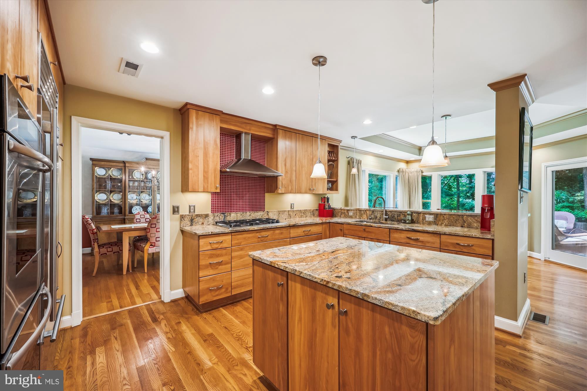 7212 Old Gate Road Rockville, MD 20852 - Photo 13 of 50 a kitchen with granite countertop a stove and a sink