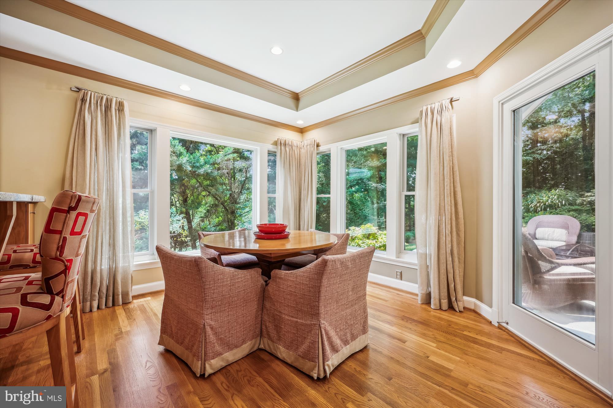 7212 Old Gate Road Rockville, MD 20852 - Photo 16 of 50 a dining room with furniture window and outside view
