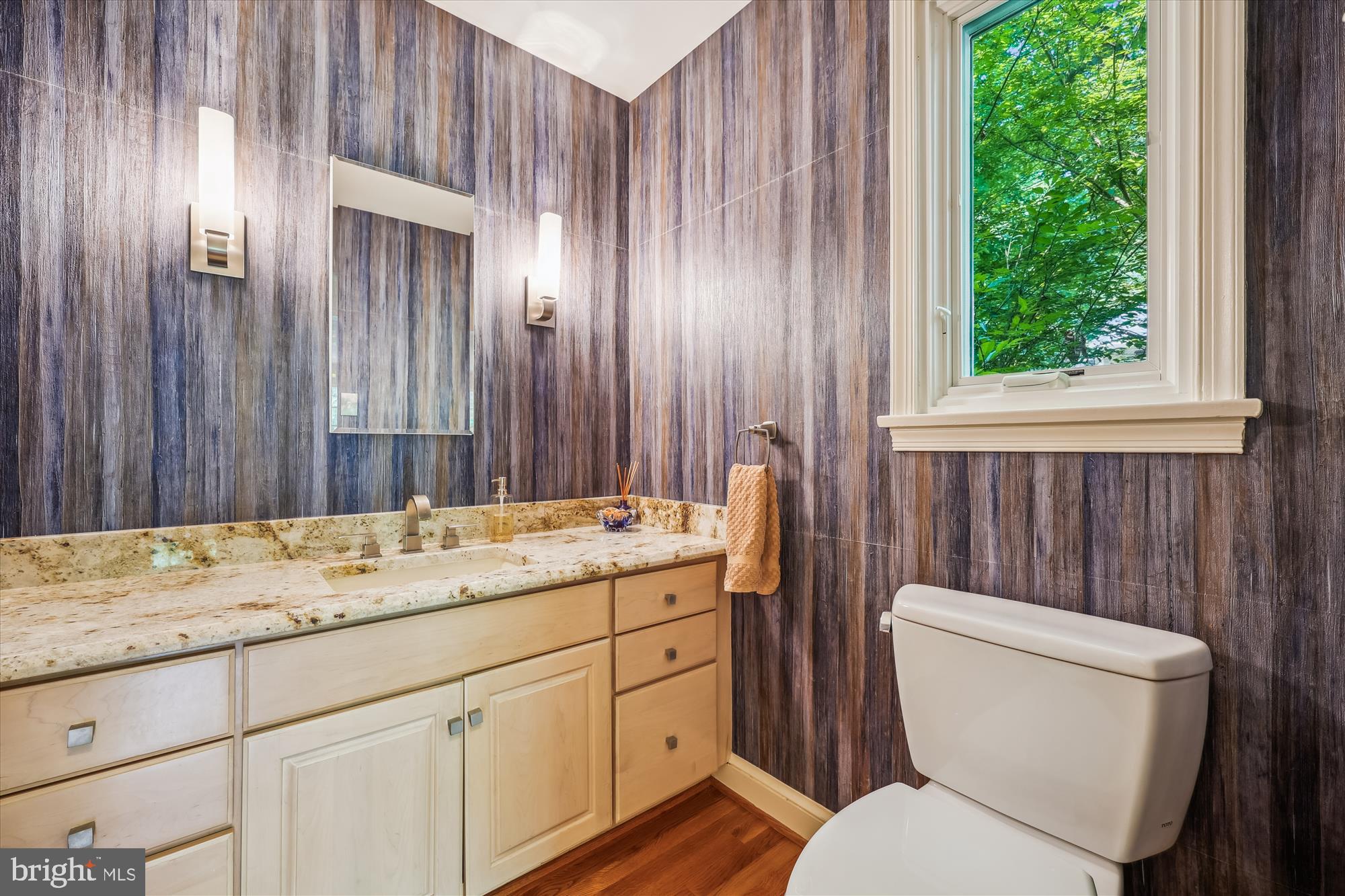 7212 Old Gate Road Rockville, MD 20852 - Photo 25 of 50 a bathroom with a toilet a sink and a window