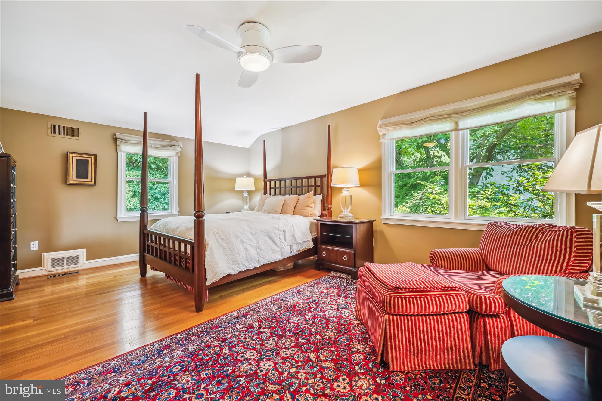7212 Old Gate Road Rockville, MD 20852 - Photo 27 of 50 a bedroom with a bed and wooden floor