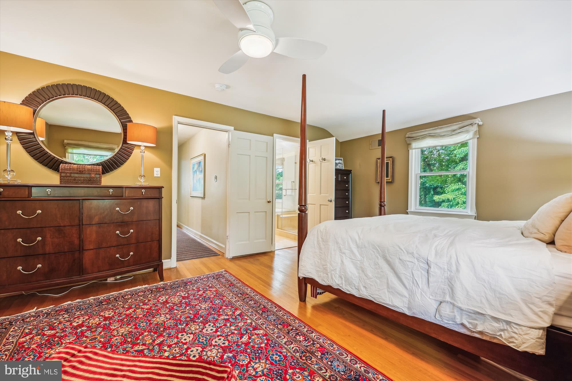 7212 Old Gate Road Rockville, MD 20852 - Photo 29 of 50 a bedroom with a bed dresser and a window