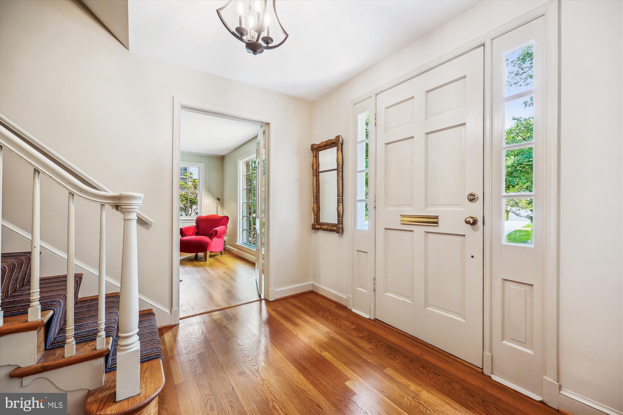 7212 Old Gate Road Rockville, MD 20852 - Photo 3 of 50 a view of a hallway view with wooden floor and staircase