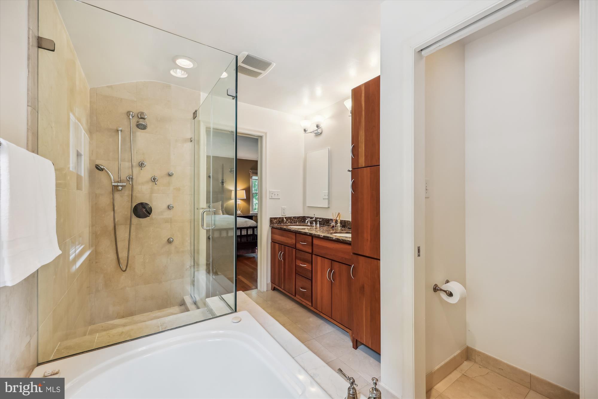 7212 Old Gate Road Rockville, MD 20852 - Photo 31 of 50 a bathroom with a shower and a sink