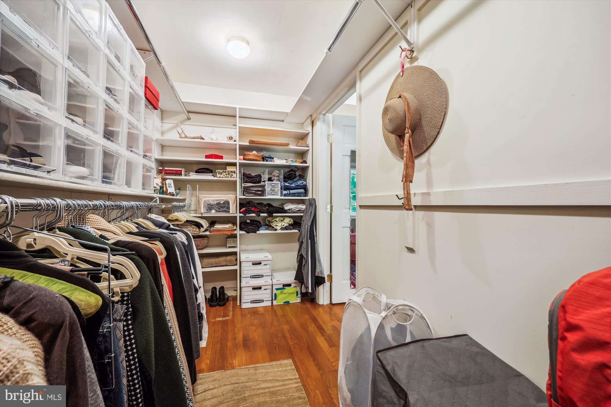 7212 Old Gate Road Rockville, MD 20852 - Photo 33 of 50 a view of walk in closet with clothes and shoes