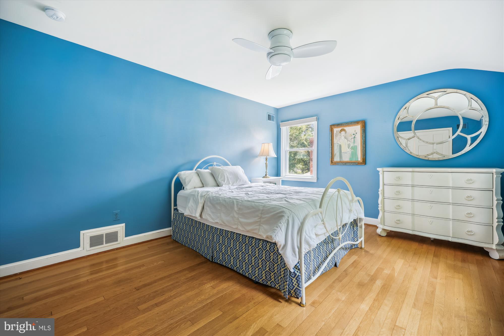 7212 Old Gate Road Rockville, MD 20852 - Photo 35 of 50 a bedroom with a bed and a dresser