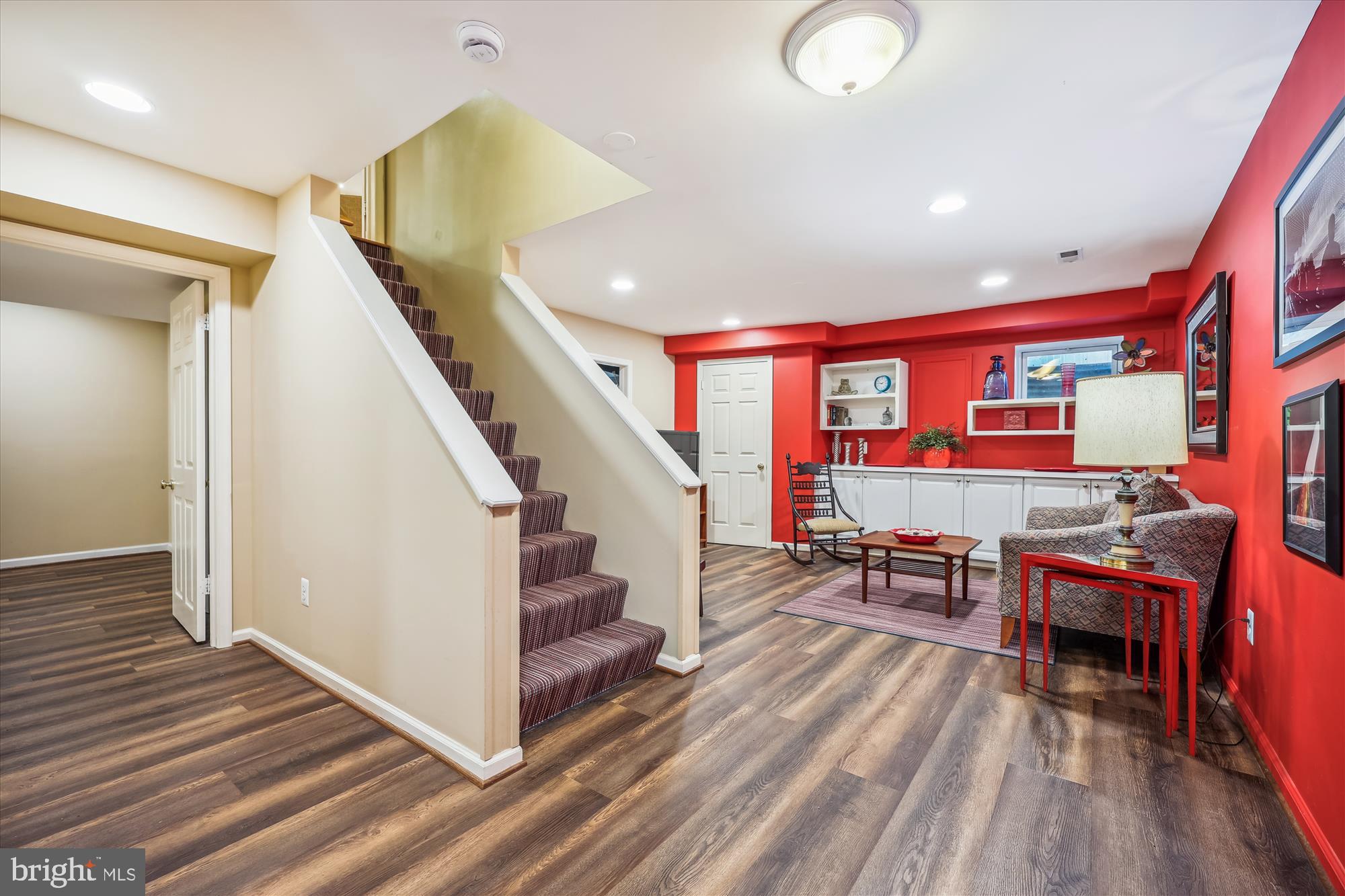 7212 Old Gate Road Rockville, MD 20852 - Photo 39 of 50 a view of a hallway with furniture and wooden floor