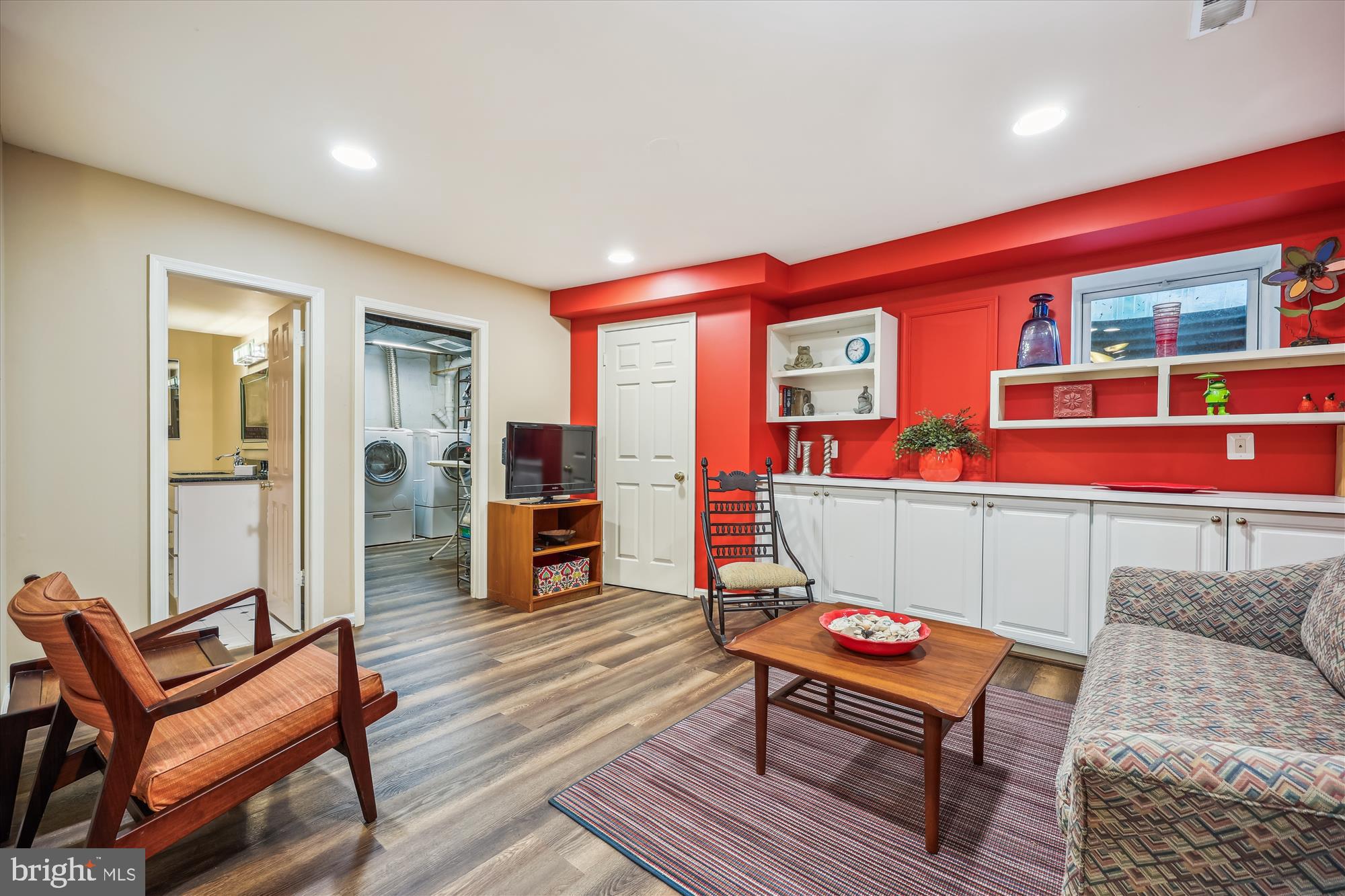7212 Old Gate Road Rockville, MD 20852 - Photo 41 of 50 a living room with furniture a rug and a table
