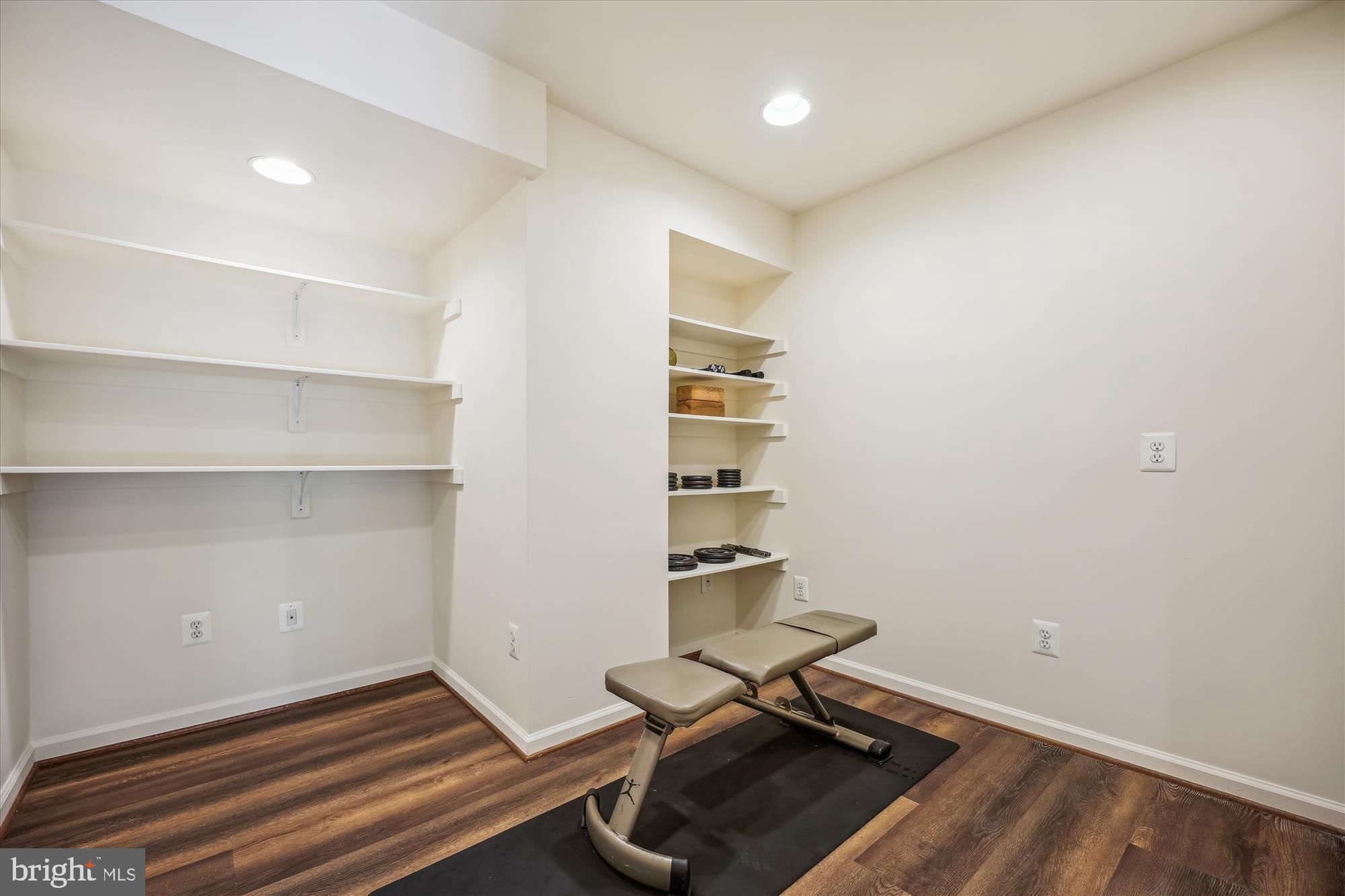 7212 Old Gate Road Rockville, MD 20852 - Photo 44 of 50 a view of a room with shelf and wooden floor