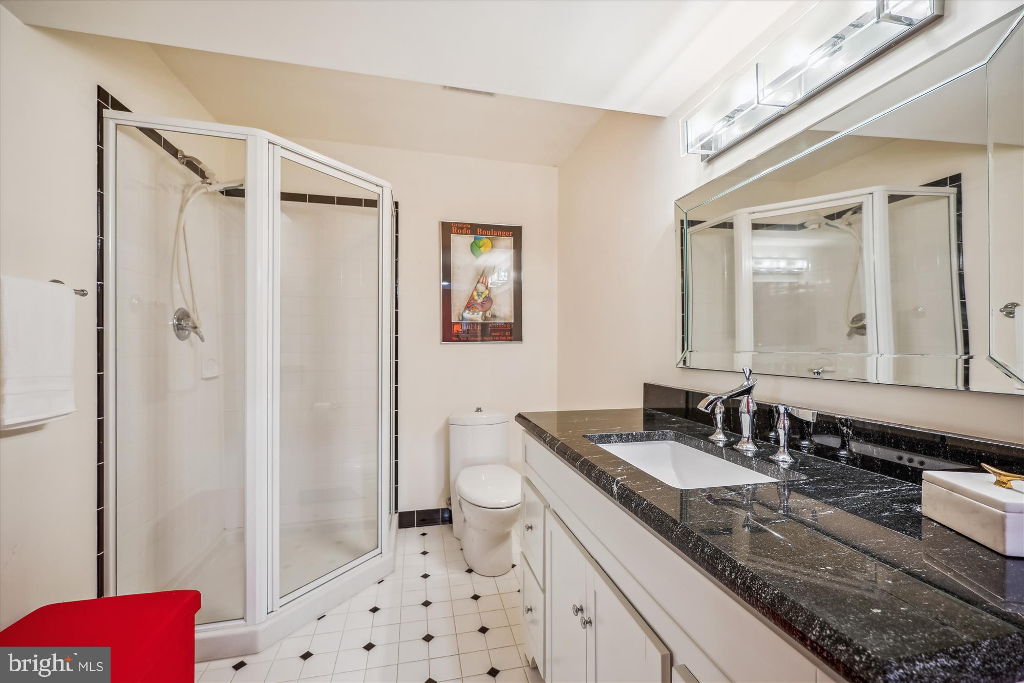 7212 Old Gate Road Rockville, MD 20852 - Photo 45 of 50 a bathroom with a granite countertop sink toilet and shower