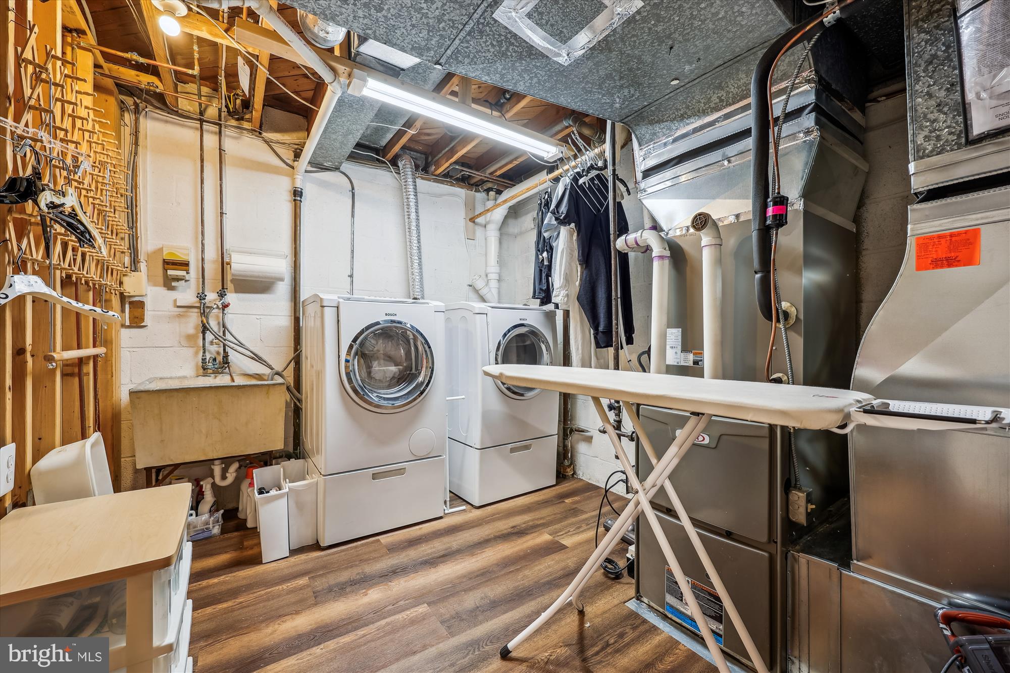 7212 Old Gate Road Rockville, MD 20852 - Photo 46 of 50 a view of walk in closet with wooden floors