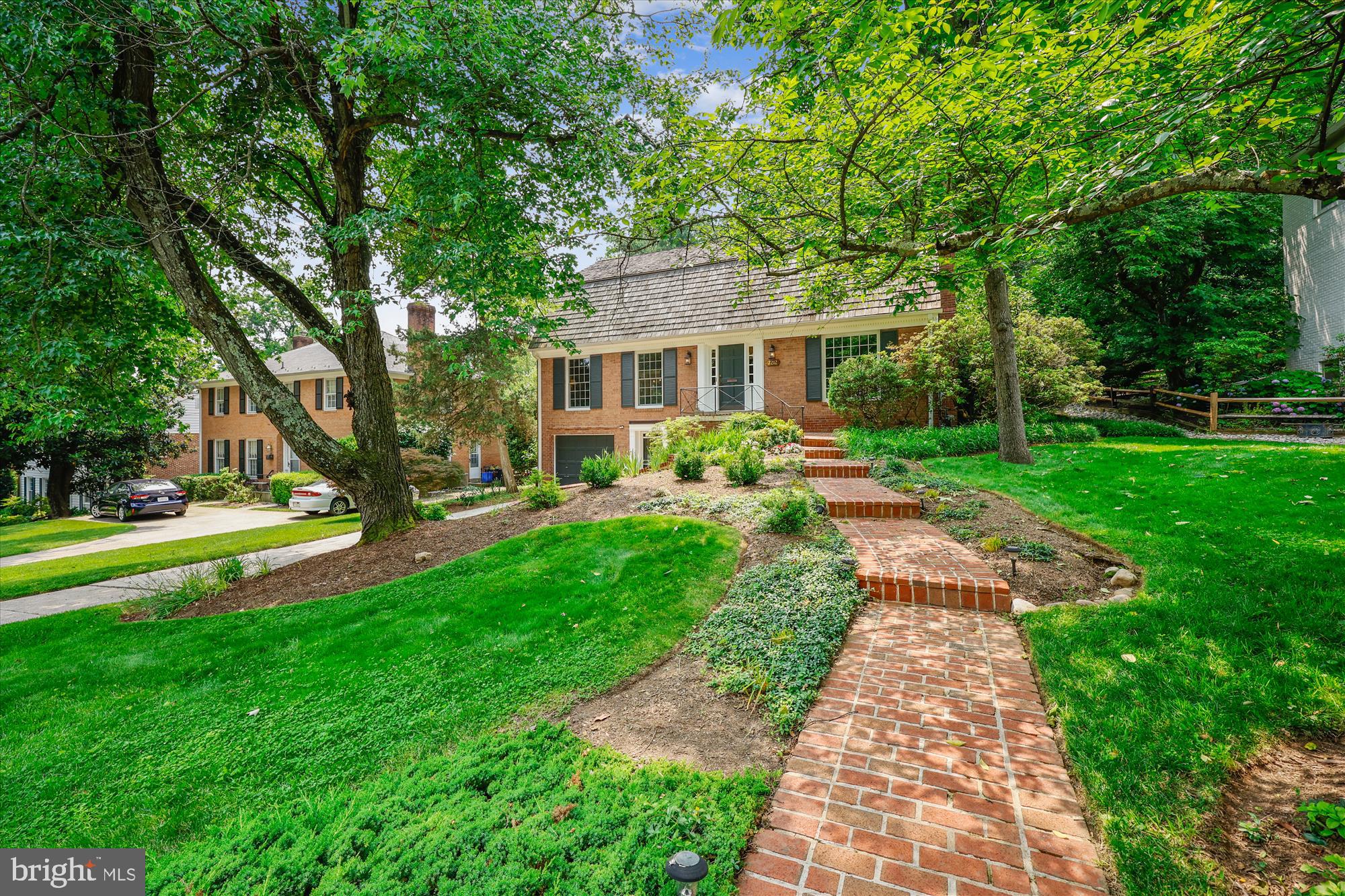 7212 Old Gate Road Rockville, MD 20852 - Photo 47 of 50 a front view of a house with garden